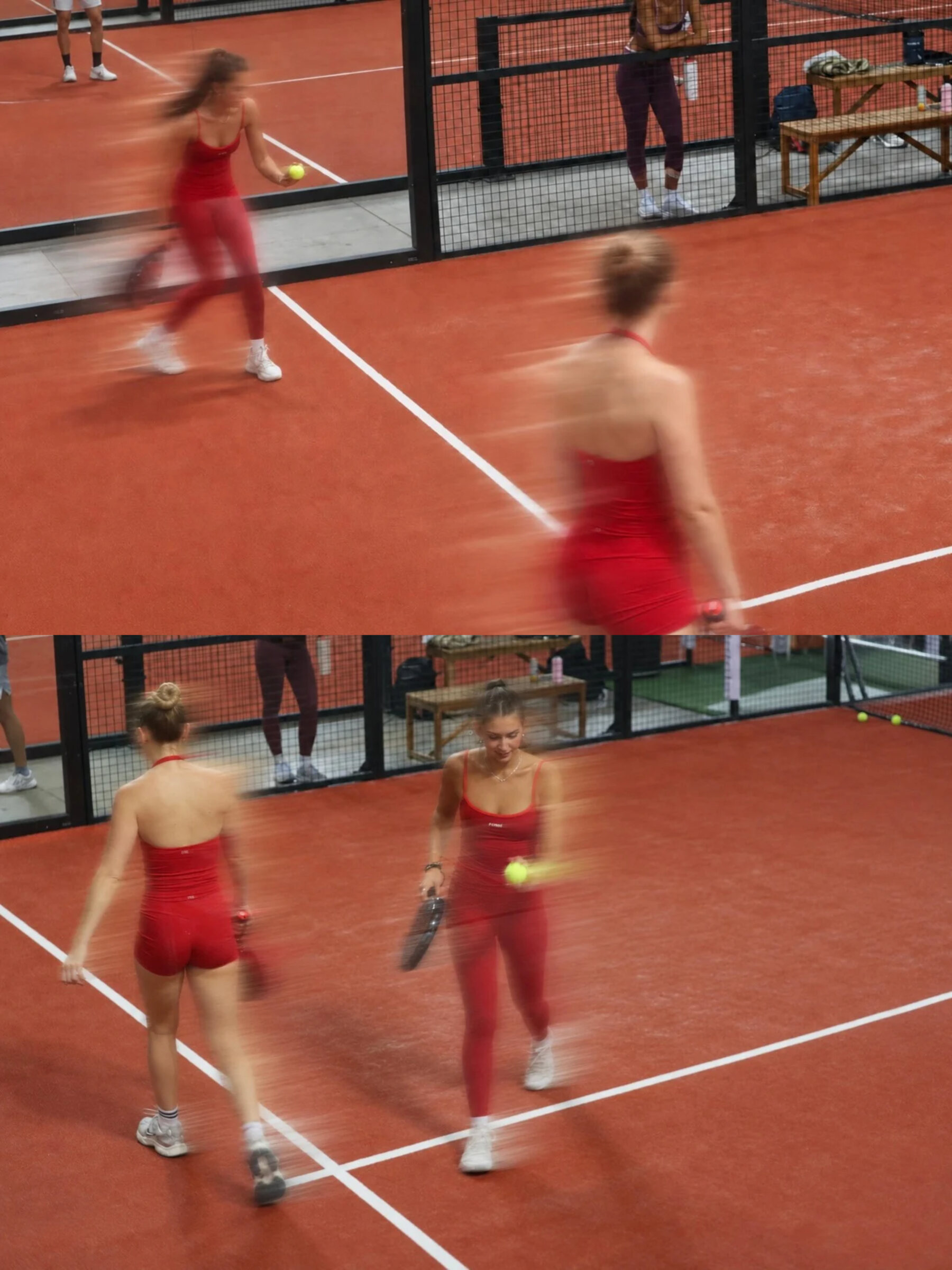 Two players in red mid-rally, motion blurred